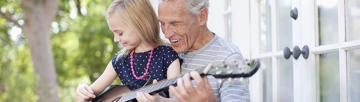 Grandpa and Daughter Playing Guitar